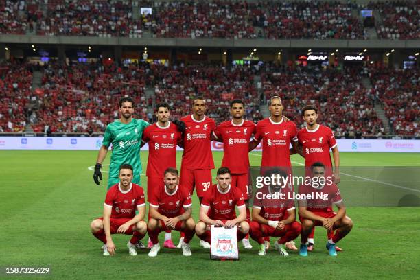 Liverpool pose for a team photo before of the start of the pre-season friendly match between Liverpool and Bayern Muenchen at the National Stadium on...