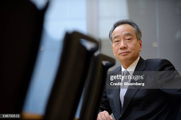 Hitoshi Tsunekage, chairman of Sumitomo Mitsui Trust Holdings Inc., poses for a photograph in Tokyo, Japan, on Tuesday, Dec. 25, 2012. Nikko Asset...