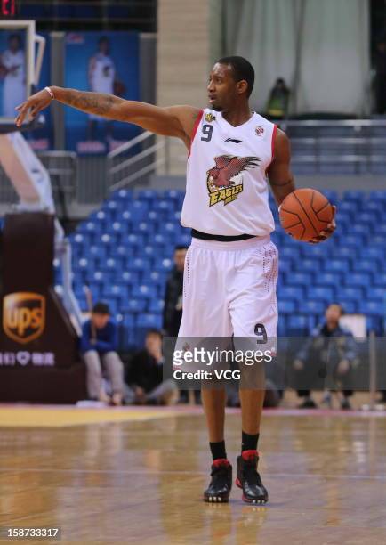 Tracy McGrady of Qingdao Eagles handles the ball during the 14th round of the CBA 12/13 game against Jiangsu Dragons at Guoxin Gymnasium on December...