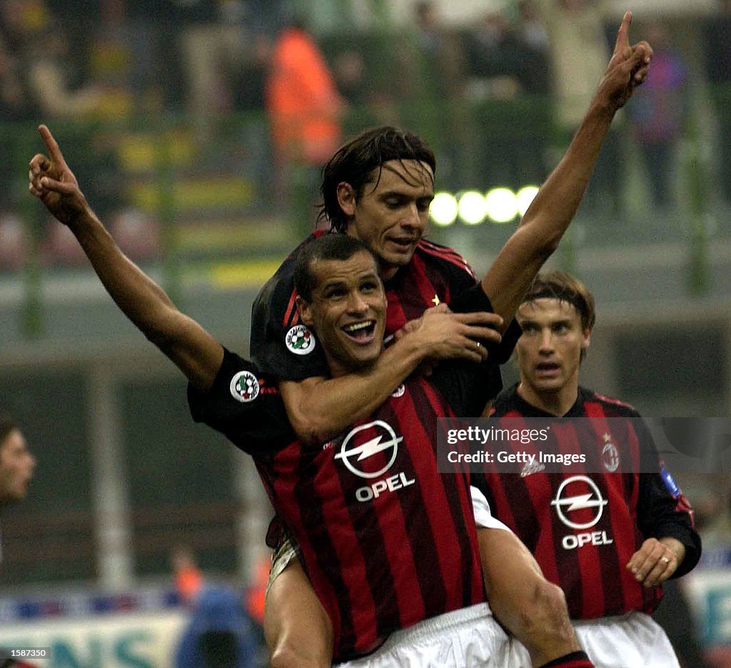 Rivaldo of AC Milan celebrates...