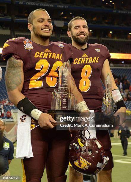 Shamari Benton and Ryan Radcliff of the Central Michigan University Chippewas stand with their trophies after the victory against the Western...