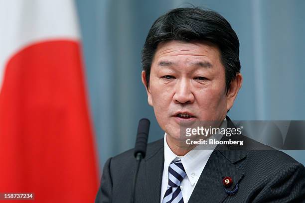 Toshimitsu Motegi, Japans newly appointed minister of economy, trade and industry, speaks during a news conference at the prime minister's official...