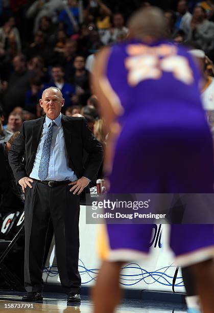 Head coach George Karl of the Denver Nuggets leads his team against Kobe Bryant and the Los Angeles Lakers at Pepsi Center on December 26, 2012 in...