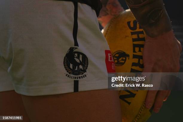 Australian Rules Football: A close up of Collingwood Football Club logo on a players shorts vs Hawthorn Football Club at Melbourne Cricket Ground....