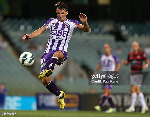 Liam Miller of the Glory traps the ball during the round 13 A-League match between the Perth Glory and the Western Sydney Wanderers at Patersons...