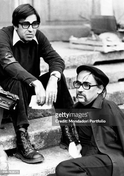 Portrait of Italian directors and brothers Paolo Taviani and Vittorio Taviani on the set of the film Allonsanfàn. Erba, 1974