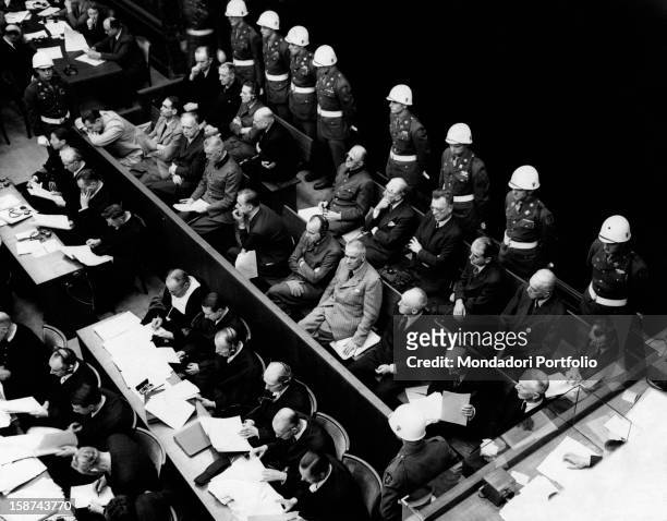 German war crimes defendants sitting in a courtroom of the International Tribunal. Among them, there are Hermann Goering, Rudolf Hess, Joachim Von...