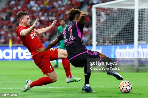 Kingsley Coman of Bayern Munich controls the ball against Andy Robertson of Liverpool during the second half of the pre-season friendly at the...