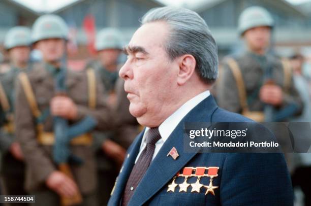 The General Secretary of the Central Committee of the Communist Party of the Soviet Union, Leonid Ilyich Brezhnev, walks in front of a group of...