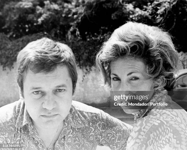 Portrait of Italian actor Paolo Villaggio with his wife Maura Albites. Viareggio, July 1968