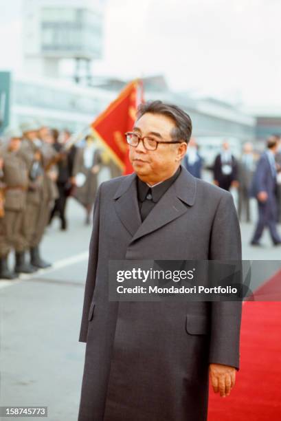 The North Korean president Kim Il Sung, born Kim Song-ju, inspects a military line while he crosses a red carpet, at the funeral of the marshal Tito....