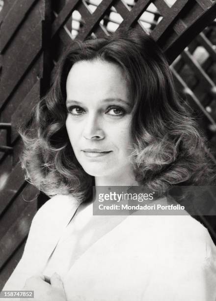 Portrait of the Italian actress Laura Antonelli on the terrace of her house. Rome, 1979
