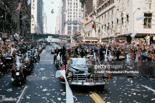 Apollo 11 American astronauts Neil Armstrong, Michael Collins and Buzz Aldrin warm welcomed by the crowd after the mission that brought them on the...