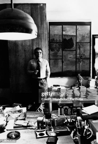 Italian director and scenarist Elio Petri posing in his study. Rome, 1978