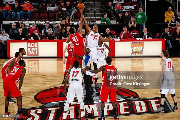 Fab Melo of the Maine Red Claws and Josh Owens of the Idaho Stampede go up for the opening tip off during the NBA D-League game on December 26, 2012...