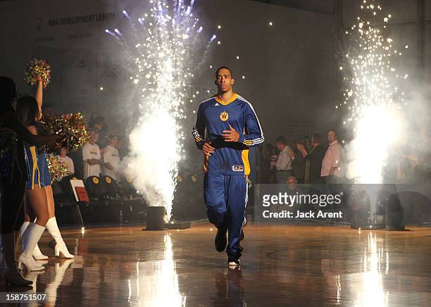 Lance Goulbourne of the Santa Cruz Warriors runs through fireworks during player introductions prior to their game against the Bakersfield Jam on...