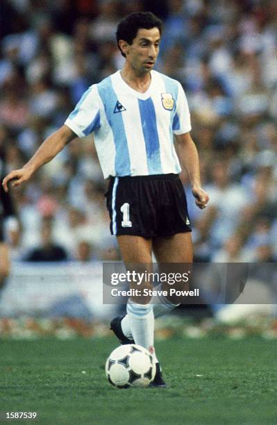 Ossie Ardiles of Argentina runs with the ball during the FIFA World Cup Finals 1982 Group C match between Argentina and Belgium held on June 13, 1982...