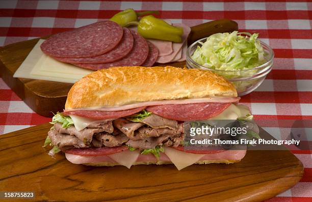 italian style submarine sandwich -  firak stock pictures, royalty-free photos & images
