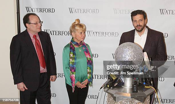 Jeffrey Straus, Kari Clark and Times Square Alliance President Tim Tompkins attend the installation of 288 New Waterford Crystals on the 2013 Times...