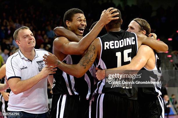 Tyrone Nash of Tuebingen celebrates with teammates after the Beko BBL Basketball Bundesliga match between Telekom Baskets Bonn and WALTER Tigers...