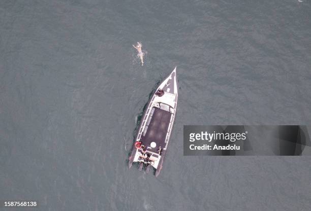 An aerial view of 22-year-old Turkish swimmer Aysu Turkoglu swimming to across the North Channel from Northern Ireland to Scotland on August 09, 2023...