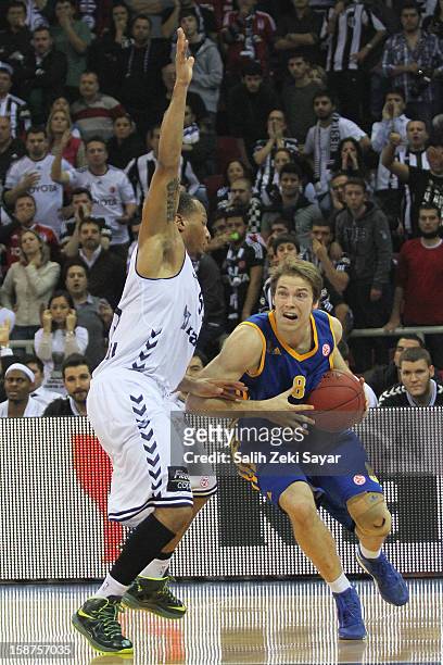 Petteri Koponen of BC Khimki Moscow competes with Curtis Jerrells of Besiktas JK Istanbul during the 2012-2013 Turkish Airlines Euroleague Top 16...