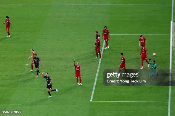 Josip Stanisic of Bayern Munich celebrates after scoring his team's third goal against Liverpool during the second half of the pre-season friendly at...