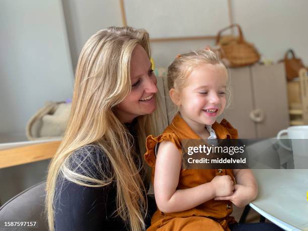 proud aunt with her niece - niece stock pictures, royalty-free photos & images