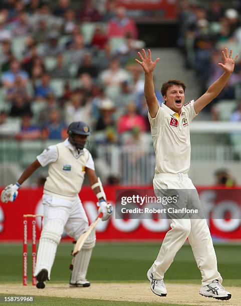 Jackson Bird of Australia takes the wicket of Thilan Samaraweera of Sri Lanka during day three of the Second Test match between Australia and Sri...