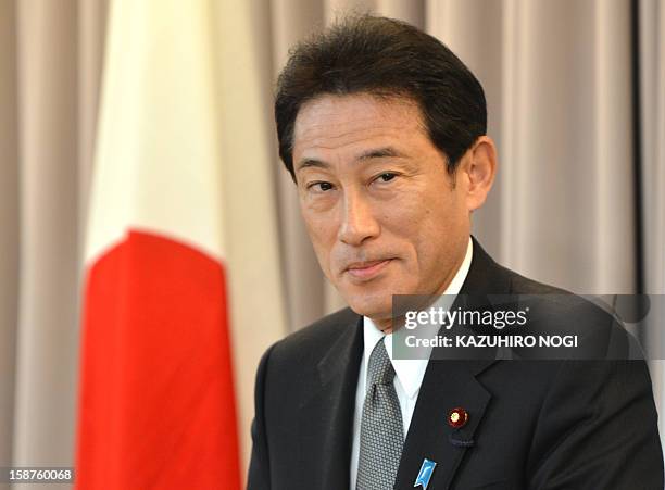 Japan's new Foreign Minister Fumio Kishida holds a news conference at the foreign ministry in Tokyo on December 28, 2012. His appointment was seen as...