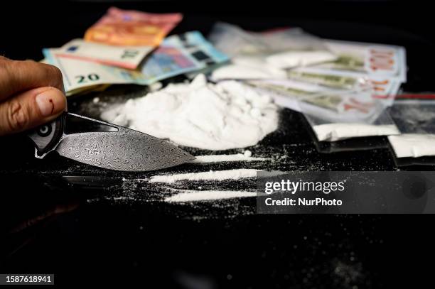 Alkaloid substance as cocaine white powder lines with Euro notes is seen in this photo illustration. On 9 August 2023 in Brussels, Belgium.