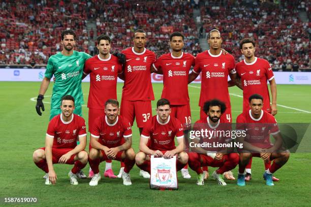 Liverpool pose for a team photo before of the start of the pre-season friendly match between Liverpool and Bayern Muenchen at the National Stadium on...