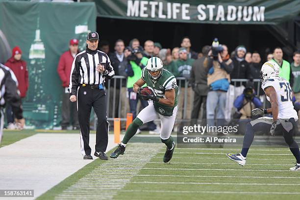 Wide Receiver Chaz Schilens of the New York Jets has a long gain against the San Diego Chargers when the New York Jets host the San Diego Chargers at...