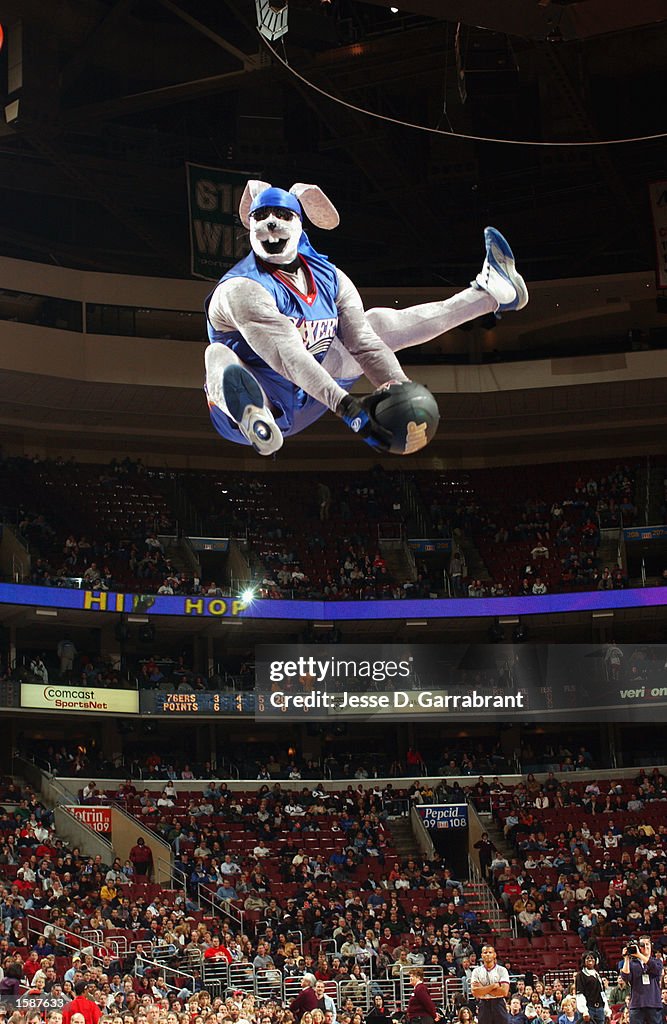 Saturday Six Rabbit Sixer mascot, Hip-Hop the stunt bunny rabbit, leaps for one of his ...
