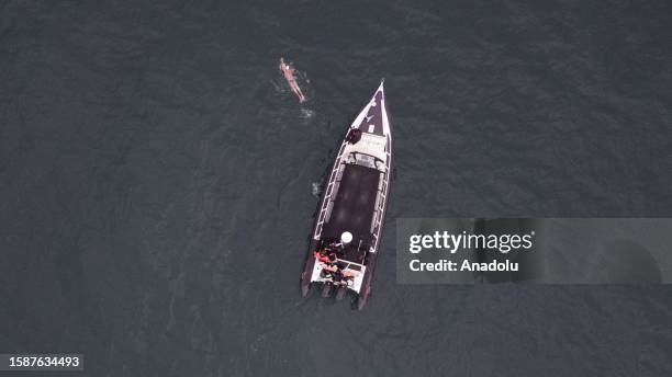 An aerial view of 22-year-old Turkish swimmer Aysu Turkoglu swimming to across the North Channel from Northern Ireland to Scotland on August 09, 2023...