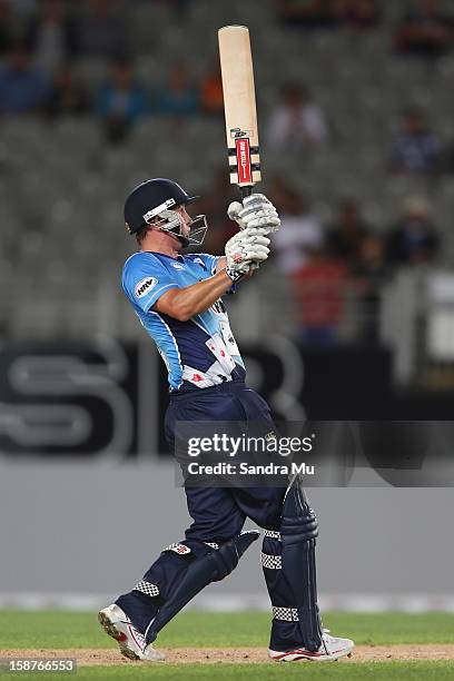 Phil Mustard of Auckland bats during the HRV Cup Twenty20 match between the Auckland Aces and Wellington Firebirds at Eden Park on December 28, 2012...