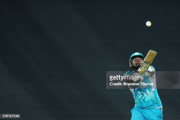 Thisara Perera of the Heat bats during the Big Bash League match between the Sydney Thunder and the Brisbane Heat at ANZ Stadium on December 28, 2012...
