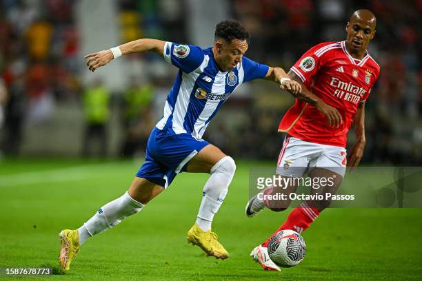 Joao Mario of SL Benfica and Pepe of FC Porto in action during the Supercopa de Portugal Final match between SL Benfica v FC Porto at Estadio...