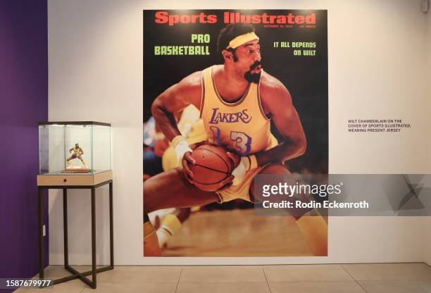 October 16, 1972 Sports Illustrated cover and signed limited edition Wilt Chamberlain sports porcelain figurine on display during the press preview...