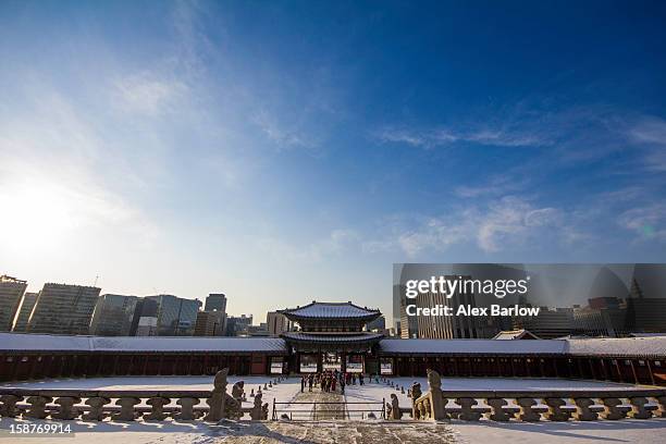 gyeongbok palace and the city - gyeongbokgung palace stock pictures, royalty-free photos & images