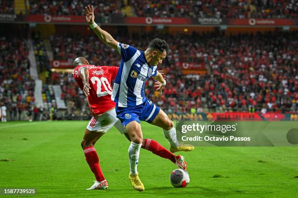 Joao Mario of SL Benfica and Pepe of FC Porto in action during the Supercopa de Portugal Final match between SL Benfica v FC Porto at Estadio...