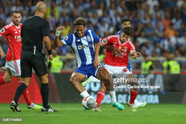 Danny Namaso of FC Porto vies with Joao Neves of SL Benfica for the ball possession during the match between SL Benfica and FC Porto for the...