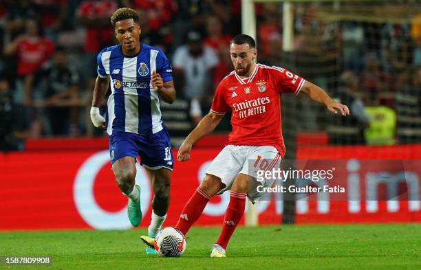 Orkun Kokcu of SL Benfica with Danny Namaso of FC Porto in action during the SuperTaca de Portugal match between SL Benfica and FC Porto at Estadio...