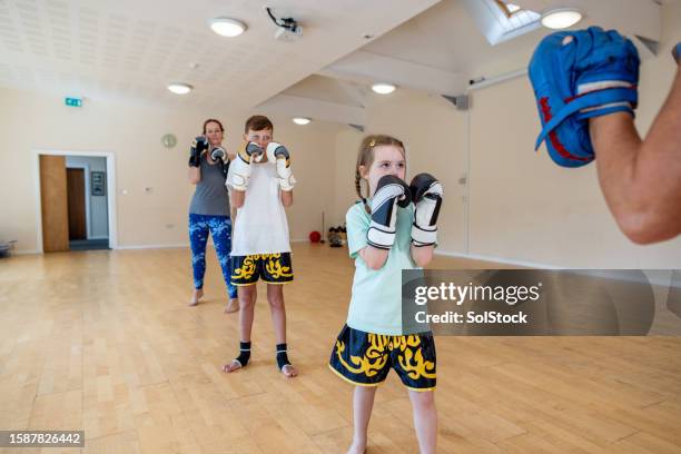 gloves up! - martial arts instructor stock pictures, royalty-free photos & images