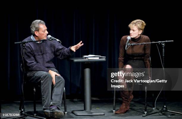 American author Paul Auster gestures as he answers as question during an interview conducted by his wife, fellow author Siri Hustvedt, at the...