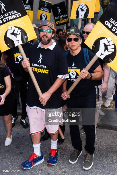 Adam Sandler and Ben Stiller are seen at the SAG-AFTRA strike in Midtown on August 02, 2023 in New York City.