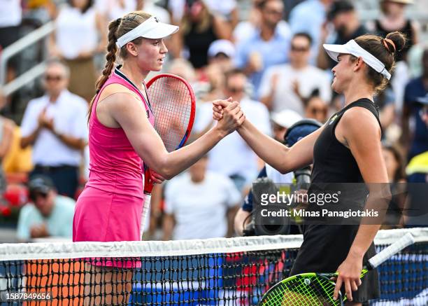 Elena Rybakina of Kazakhstan shakes hands with Jennifer Brady of the United States of America after their match on Day 3 during the National Bank...