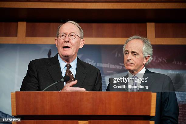 Republican Senators Lamar Alexander, left, and Bob Corker, both from Tennessee, hold a news conference in Washington, D.C., U.S., on Friday, Dec. 28,...