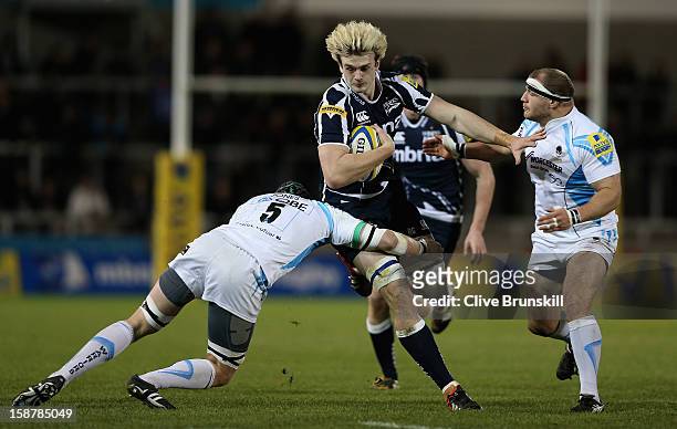 Richie Gray of Sale Sharks attempts to move past Chris Jones of Worcester Warriors during the Aviva Premiership match between Sale Sharks and...