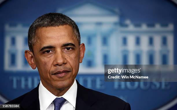 President Barack Obama said he was "modestly optimistic" while making a statement on fiscal cliff negotiations following a meeting with Congressional...